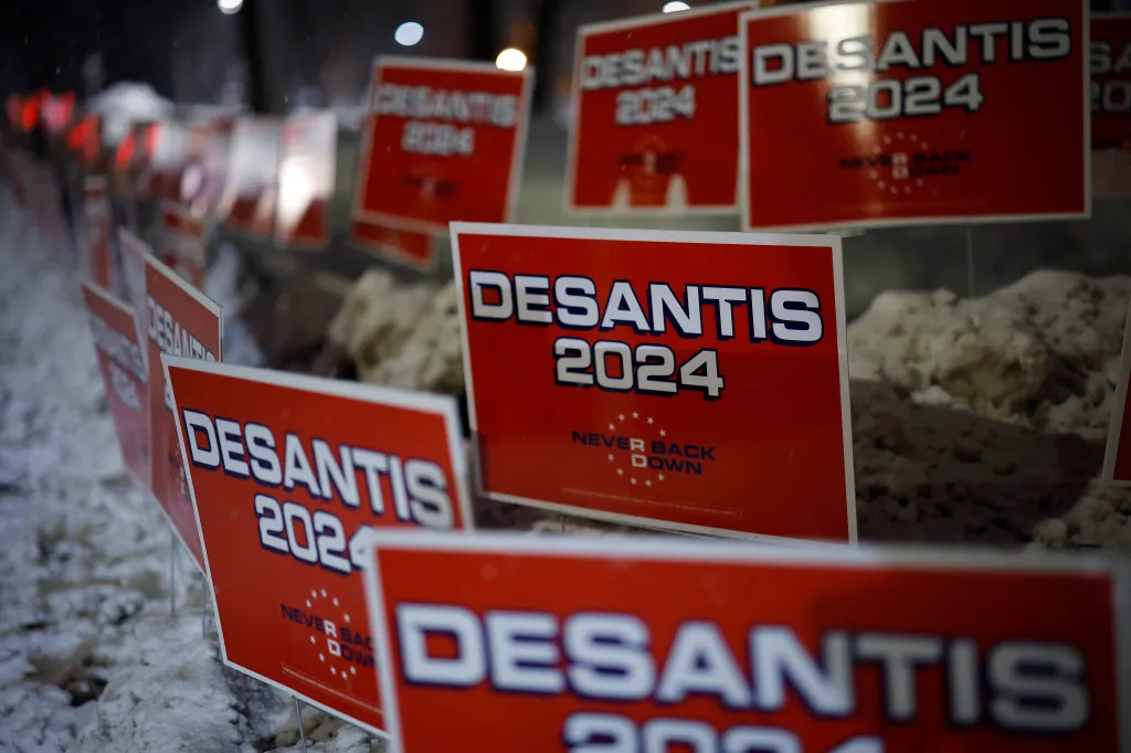 Campaign signs for Republican presidential candidate, Florida Gov. Ron Desantis line the road in front of Drake University, where CNN is hosting a presidential debate on January 10, 2024 in Des Moines, Iowa.