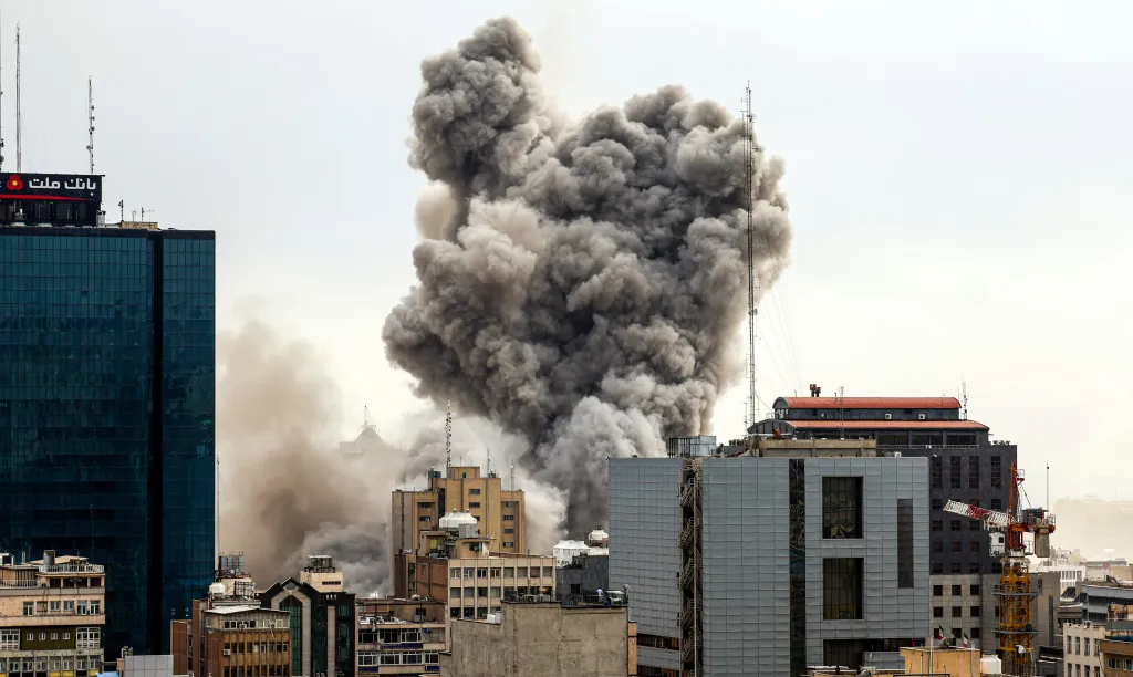 A general view of Tehran with smoke visible in the distance after explosions were reported in the city, on March 2, 2026 in Tehran, Iran. 