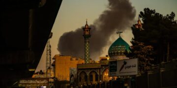 Oil and gas shutdowns in Iraq and Kuwait widen the Iran war’s impact on energy prices, while the U.S. lines up insurance and naval escorts in response