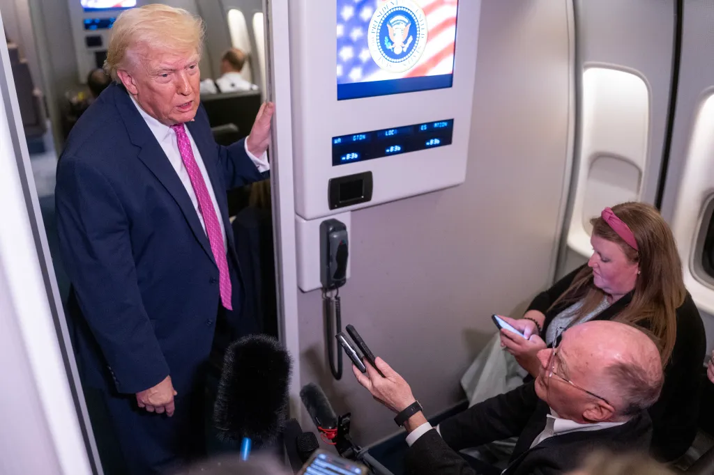 President Donald Trump speaks with members of the media onboard Air Force One on March 29, 2026 while en route to Joint Base Andrews, Maryland from West Palm Beach Florida.