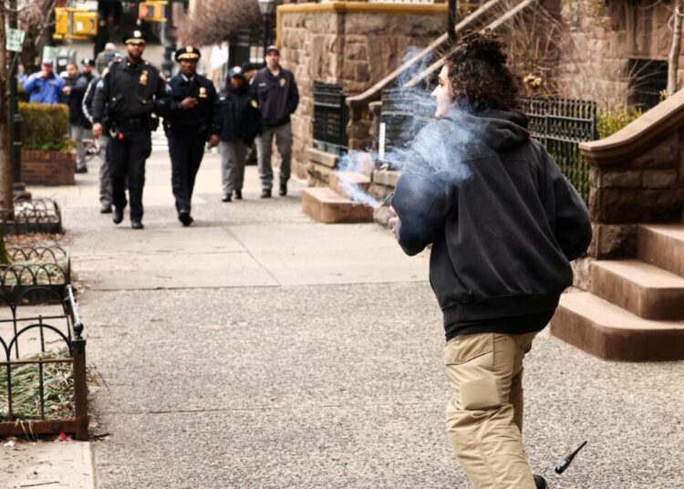 Two charged with throwing bombs at NYC protest cited ISIS, complaint says