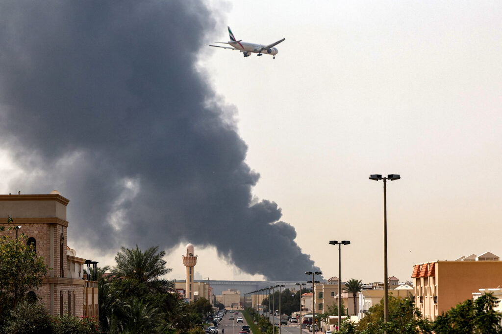 Iran targets commerce as drone hits Dubai airport; Israel says war will go on
