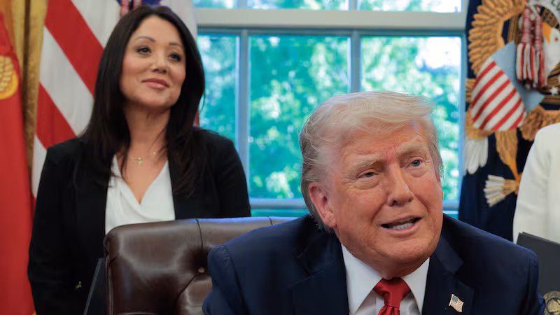 President Donald Trump speaks to the media as Secretary of Labor Lori Chavez-DeRemer look on after signing executive orders in the Oval Office at the White House on April 23, 2025 in Washington, DC.