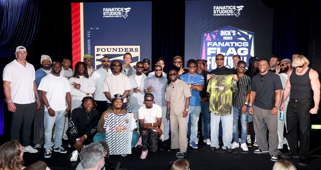 Group photo of athletes and celebrities at the Fanatics Flag Football Classic Draft.