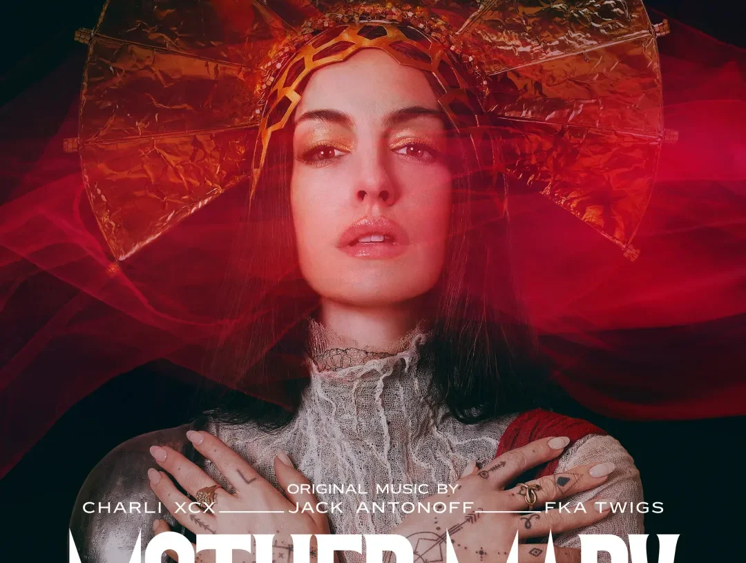 Anne Hathaway Delivers a Haunting Performance on Dark Pop Song ‘Burial’ From Her New A24 Movie ‘Mother Mary’