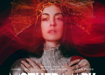 Anne Hathaway Delivers a Haunting Performance on Dark Pop Song ‘Burial’ From Her New A24 Movie ‘Mother Mary’