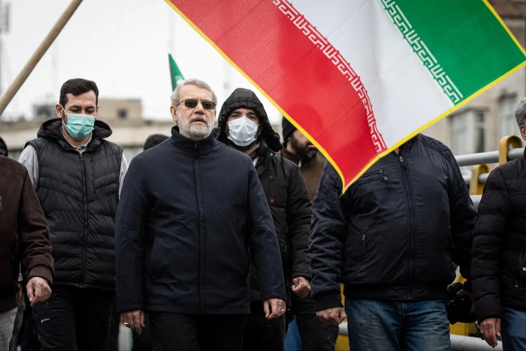 Iranian security chief Ali Larijani takes part in a pro-government rally in Tehran.
