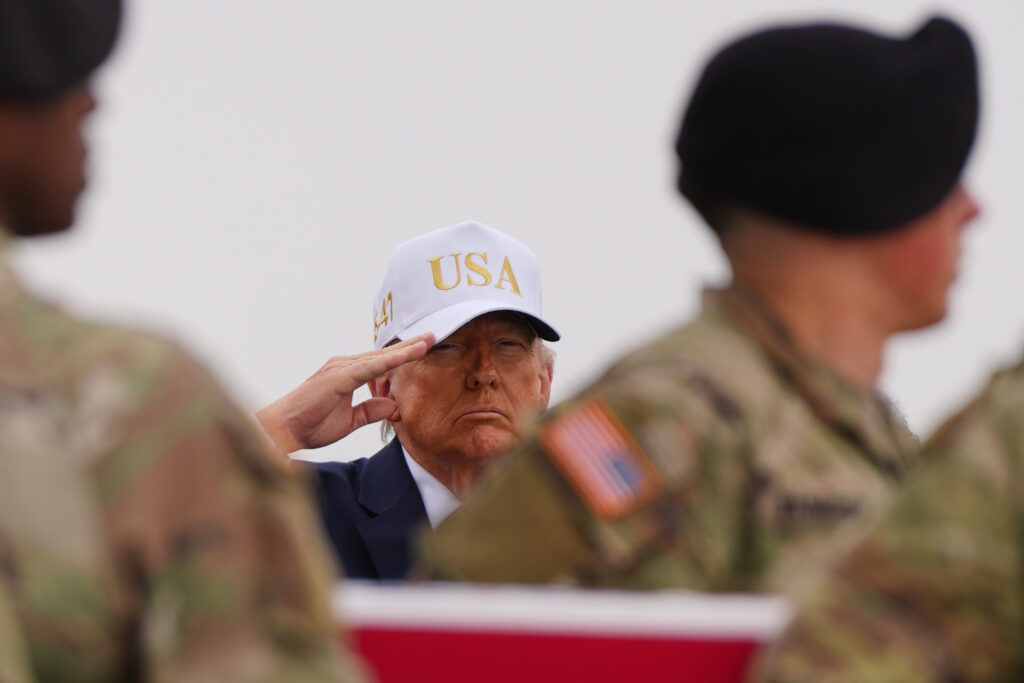 Trump’s wearing of baseball cap during dignified transfer draws criticism
