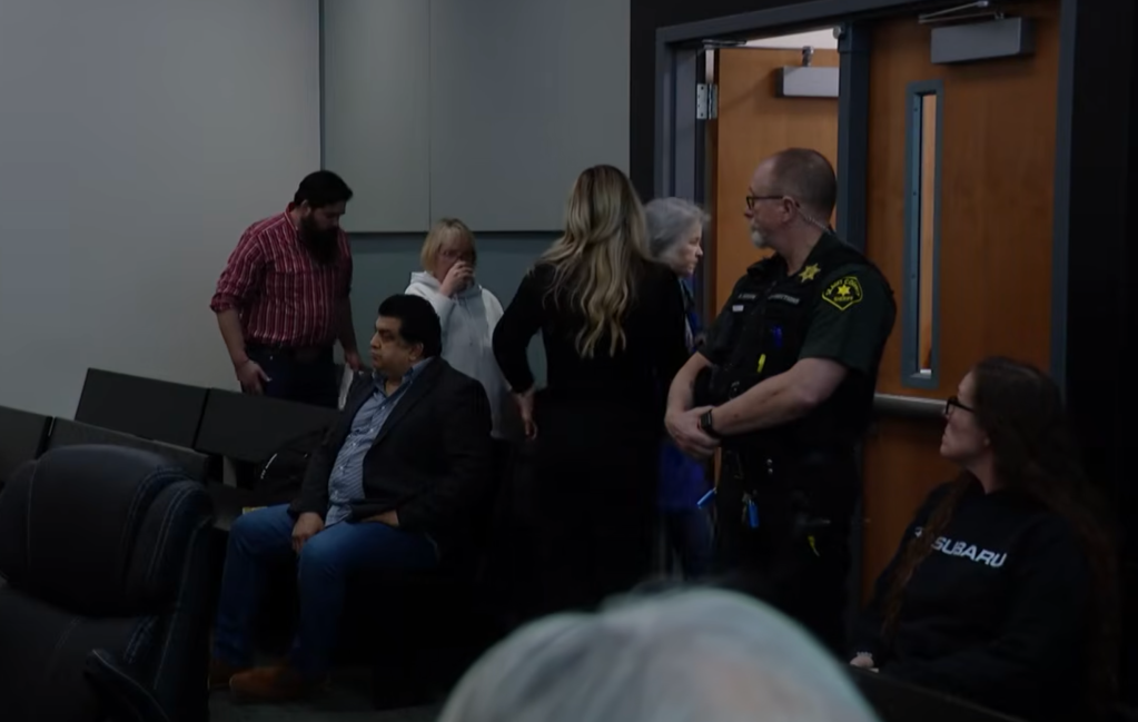 Hunt's relatives leave the courtroom after Delgado's appearance.