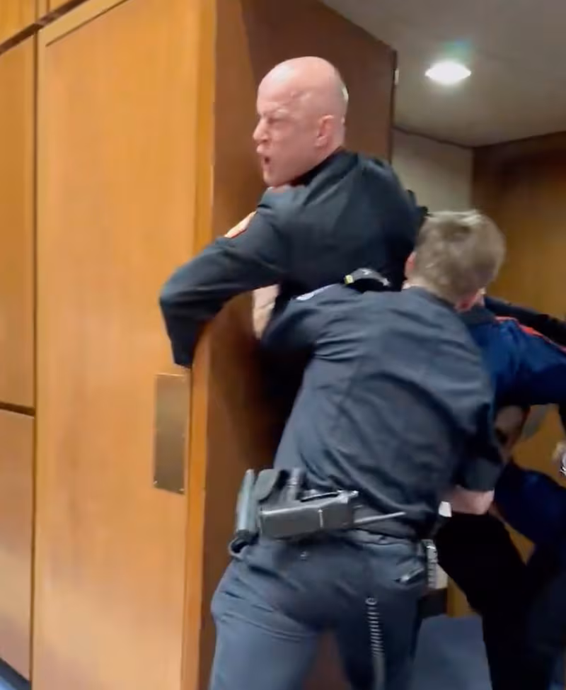 The moment McGinnis, with anguish oin his face, appeared to have his arm broken.