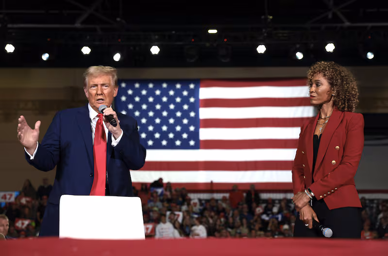 LANCASTER, PENNSYLVANIA - OCTOBER 20: Republican presidential nominee, former U.S. President Donald Trump, speaks alongside moderator Sage Steele during a town hall campaign event at the Lancaster County Convention Center on October 20, 2024 in Lancaster, Pennsylvania. Trump is campaigning the entire day in the state of Pennsylvania. Trump and Democratic presidential nominee Vice President Kamala Harris continue to campaign in battleground swing states ahead of the November 5 election. (Photo by Win McNamee/Getty Images)