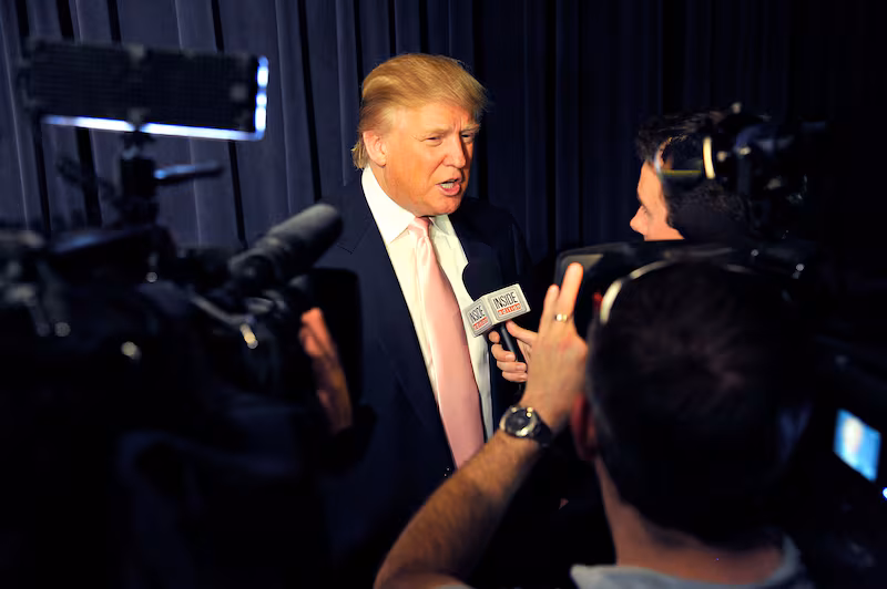 President Donald Trump speaks with reporters during An Evening with "The Celebrity Apprentice" at Florence Gould Hall on April 26, 2011, in New York City.