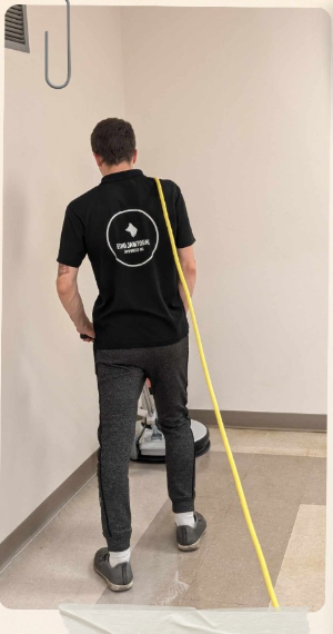 Rick Chorney mopping the floor