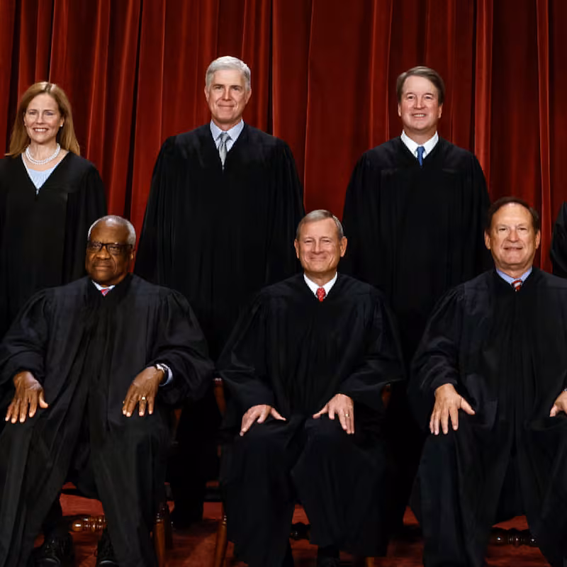 U.S. Supreme Court justices Amy Coney Barrett, Neil Gorsuch, Brett Kavanaugh, Ketanji Brown Jackson, Sonia Sotomayor, Clarence Thomas, Chief Justice John Roberts, Jr., Samuel Alito and Elena Kagan pose for a group portrait in Washington, D.C. on October 7, 2022.
