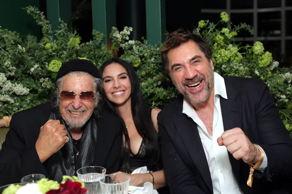Al Pacino, Noor Alfallah, and Javier Bardem at the Chanel and Charles Finch Pre-Oscar Dinner.