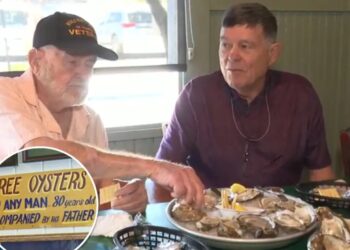 Aw, shucks! 99-year-old dad helps son, 80, finally crack free oysters promotion at Alabama restaurant after 50-year wait