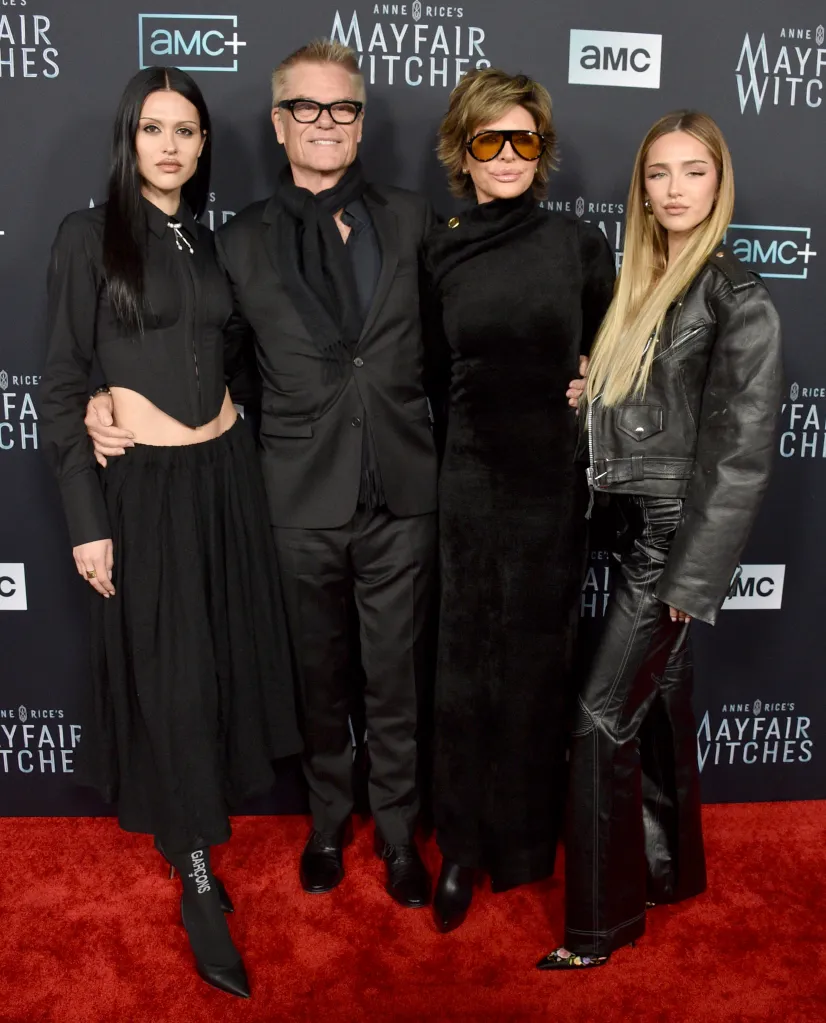 Amelia Gray Hamlin, Harry Hamlin, Lisa Rinna, and Delilah Belle Hamlin pose together on the red carpet.