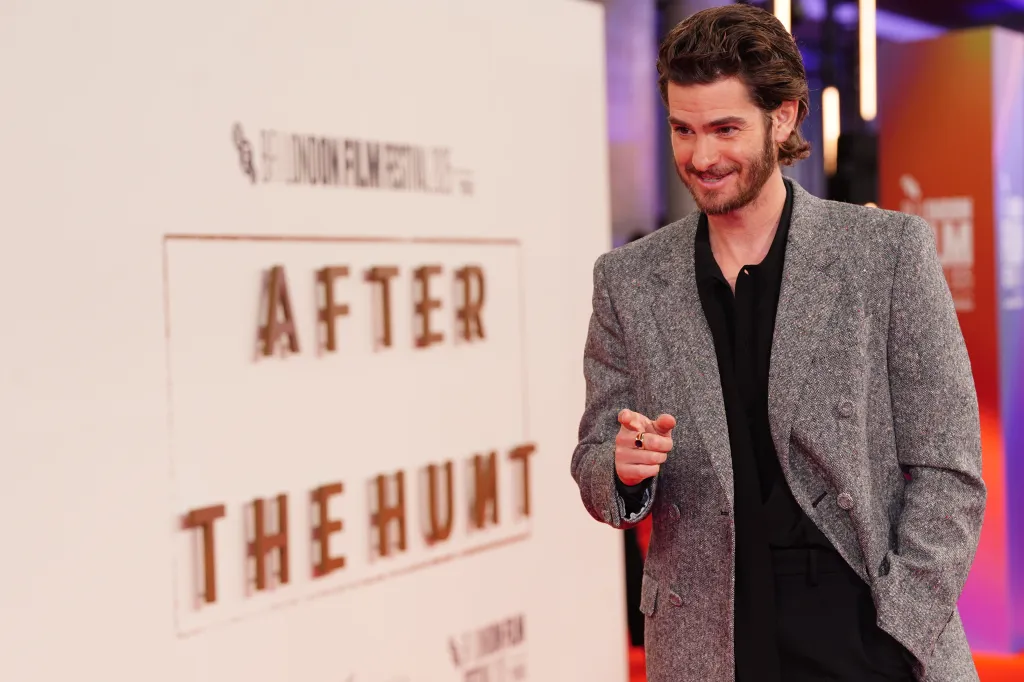Andrew Garfield pointing towards the camera at the screening of