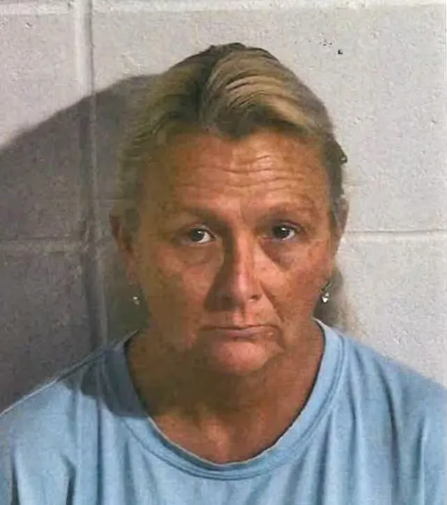 Mugshot of Angela Burkhalter, the ex-police chief accused of stealing from a children's Christmas fund.