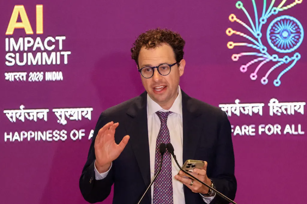 Anthropic CEO Dario Amodei delivering a speech at the AI Impact Summit in New Delhi.