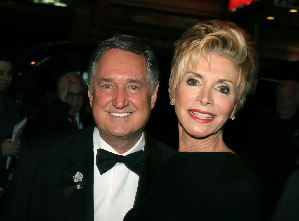 Neil Sedaka and his wife Leba smiling at the Broadway opening night of 