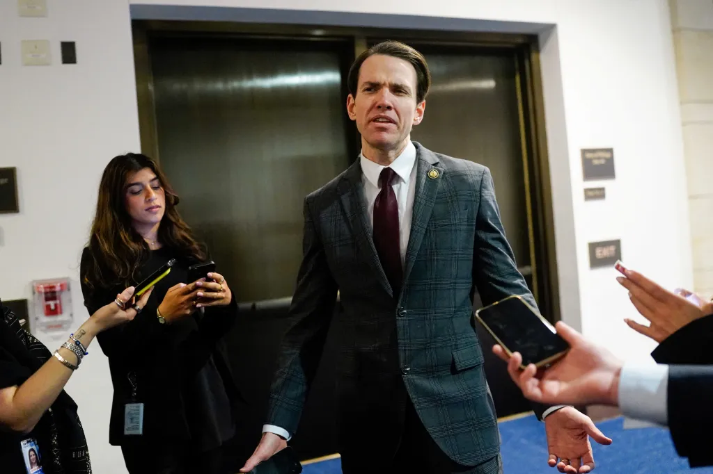 U.S. Representative Kevin Kiley (I-CA) is surrounded by media holding phones at the U.S. Capitol.