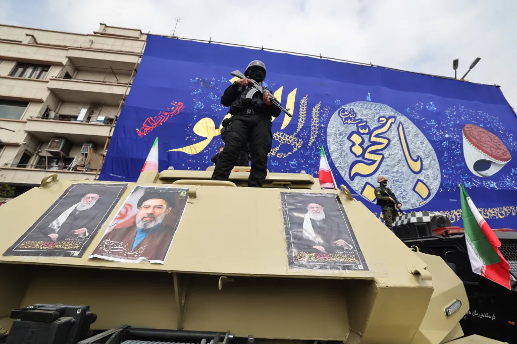 Members of the Iranian security forces stand guard during the funerals of Iran's Revolutionary Guards Corps in Tehran, Iran, on March 11, 2026.