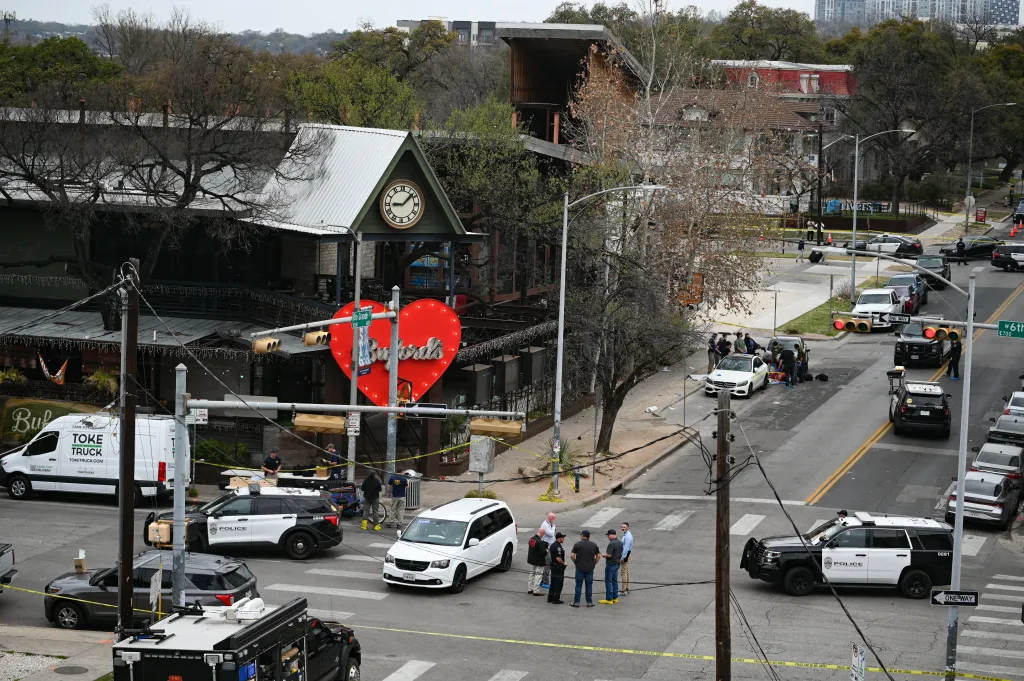 An aerial view shows police and FBI investigating a shooting scene at Buford's on 6th Street in Austin, Texas.