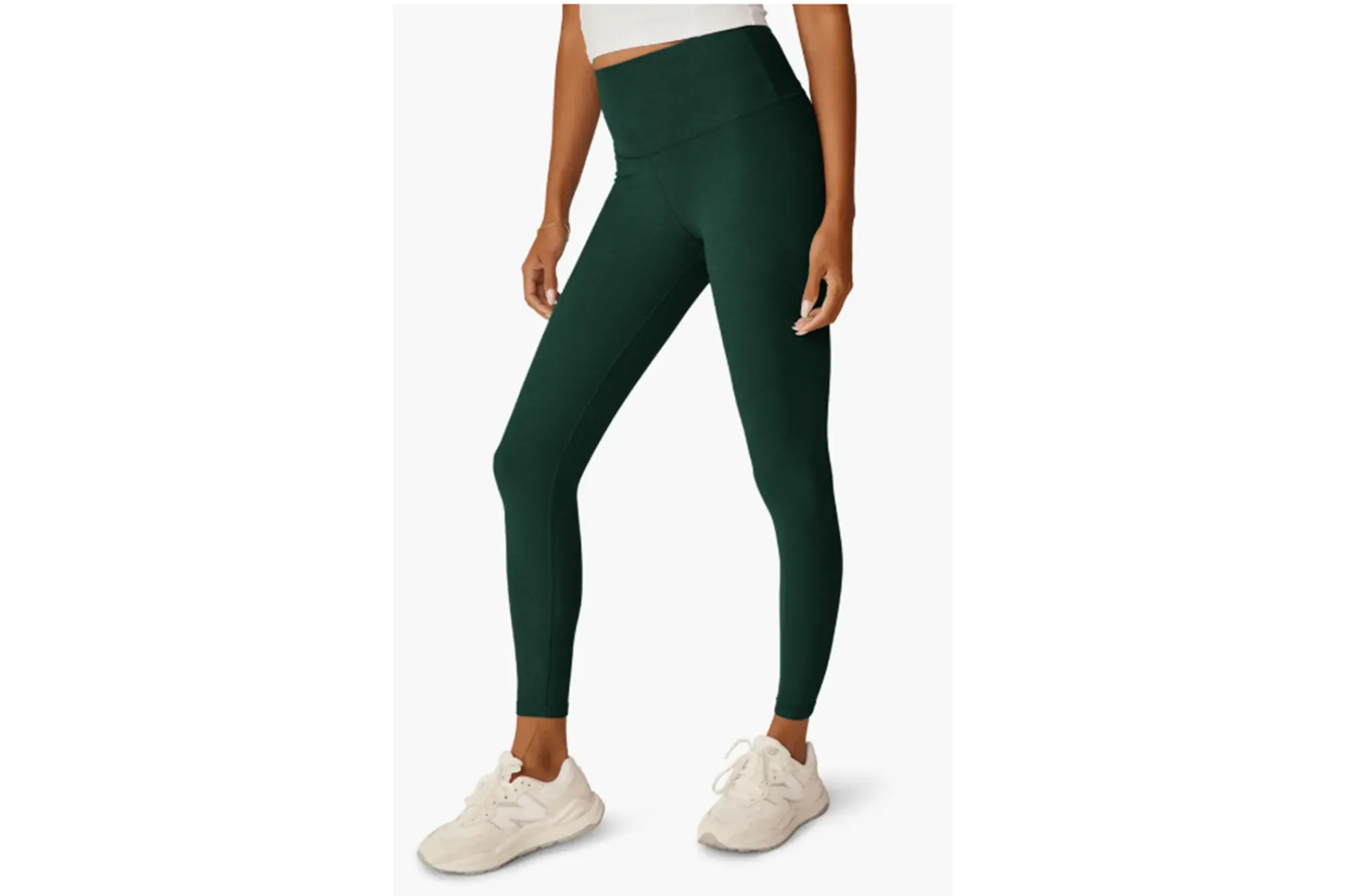 A model in green leggings
