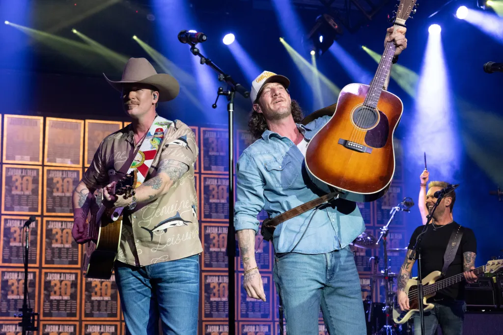 Brian Kelley and Tyler Hubbard of Florida Georgia Line performing on stage.