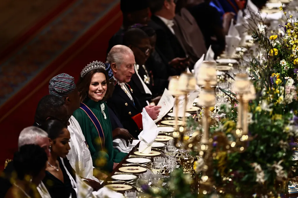 Catherine, Princess of Wales, smiling at a state banquet at Windsor Castle.