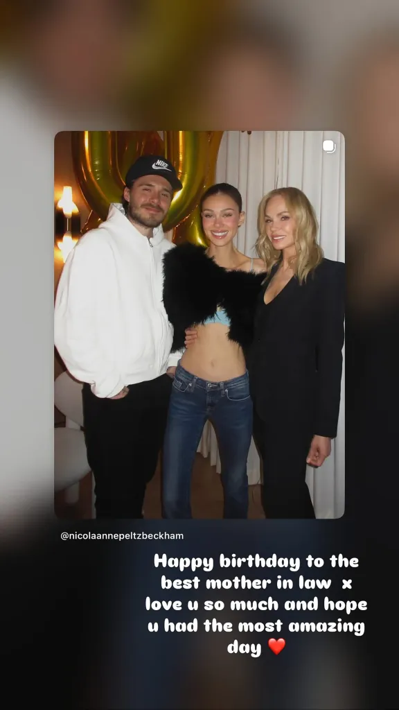 Brooklyn Beckham, Nicola Peltz Beckham, and Claudia Peltz stand together with a golden balloon in the background.