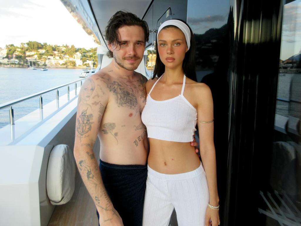 Brooklyn and Nicola Beckham on a yacht.