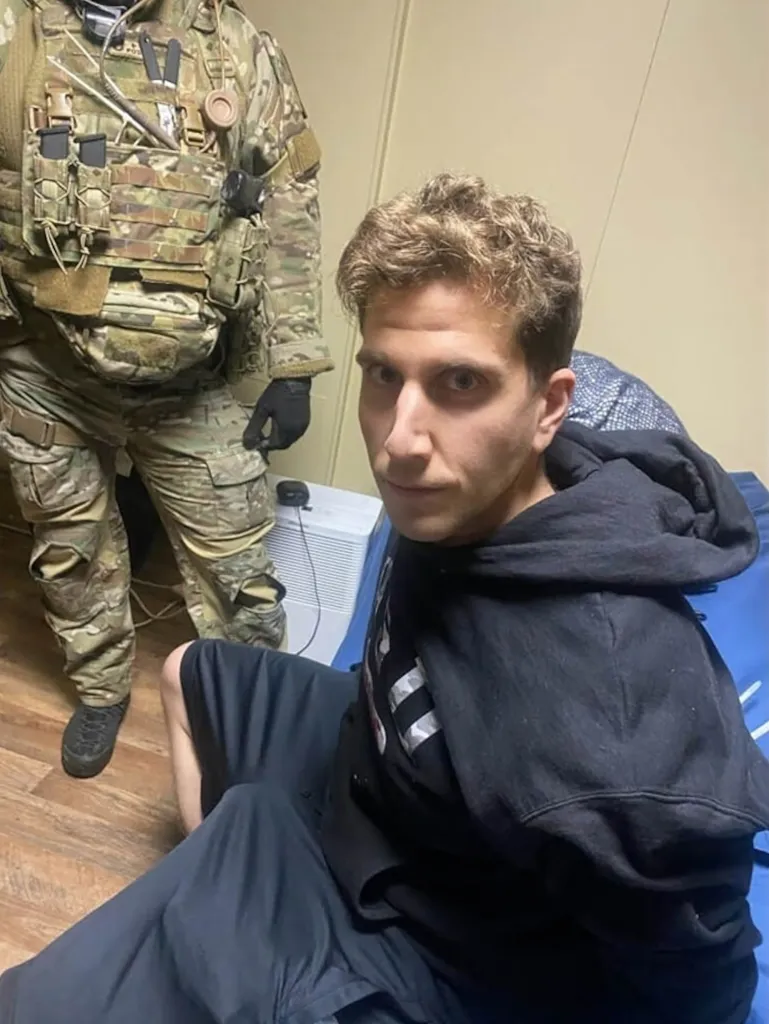 Bryan Kohberger is handcuffed moments after his arrest on Dec. 30, 2022.