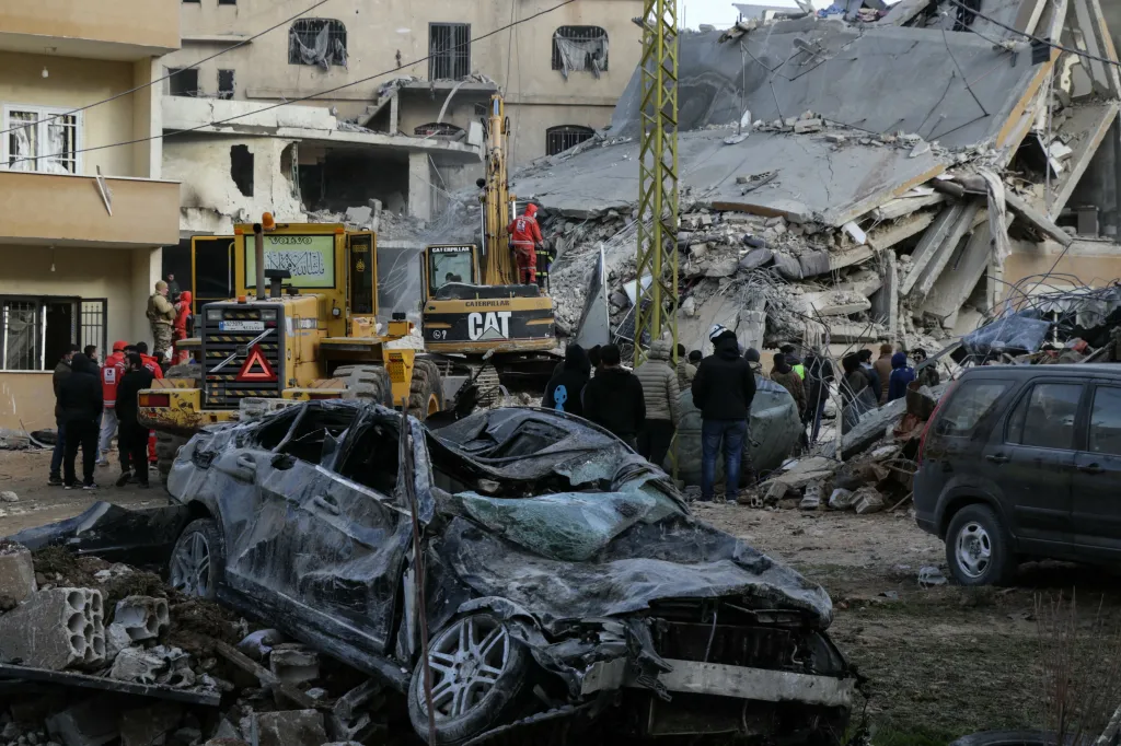 Emergency personnel search for victims at the site of an Israeli airstrike that targeted a residential compound in Baalbeck, Lebanon.