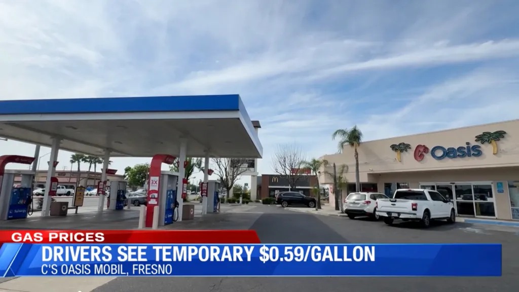 A gas station with a Mobil sign selling gas for $0.59/gallon.