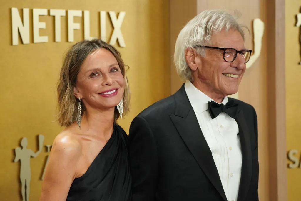 Calista Flockhart and Harrison Ford at an awards event.