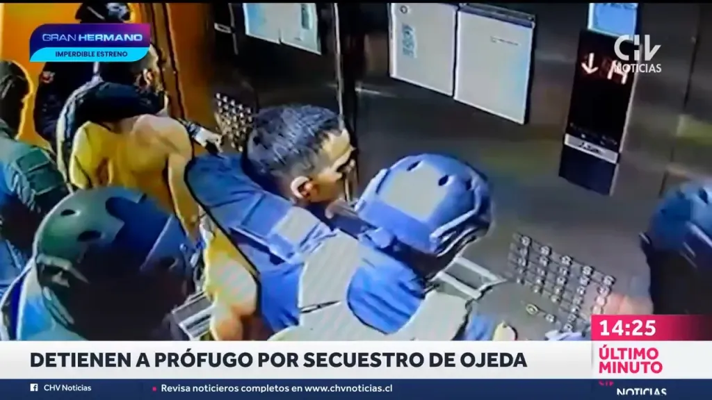 People in protective gear apprehending a suspect inside an elevator.