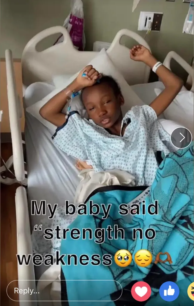 A boy in a hospital bed with an IV, recovering from being shot.
