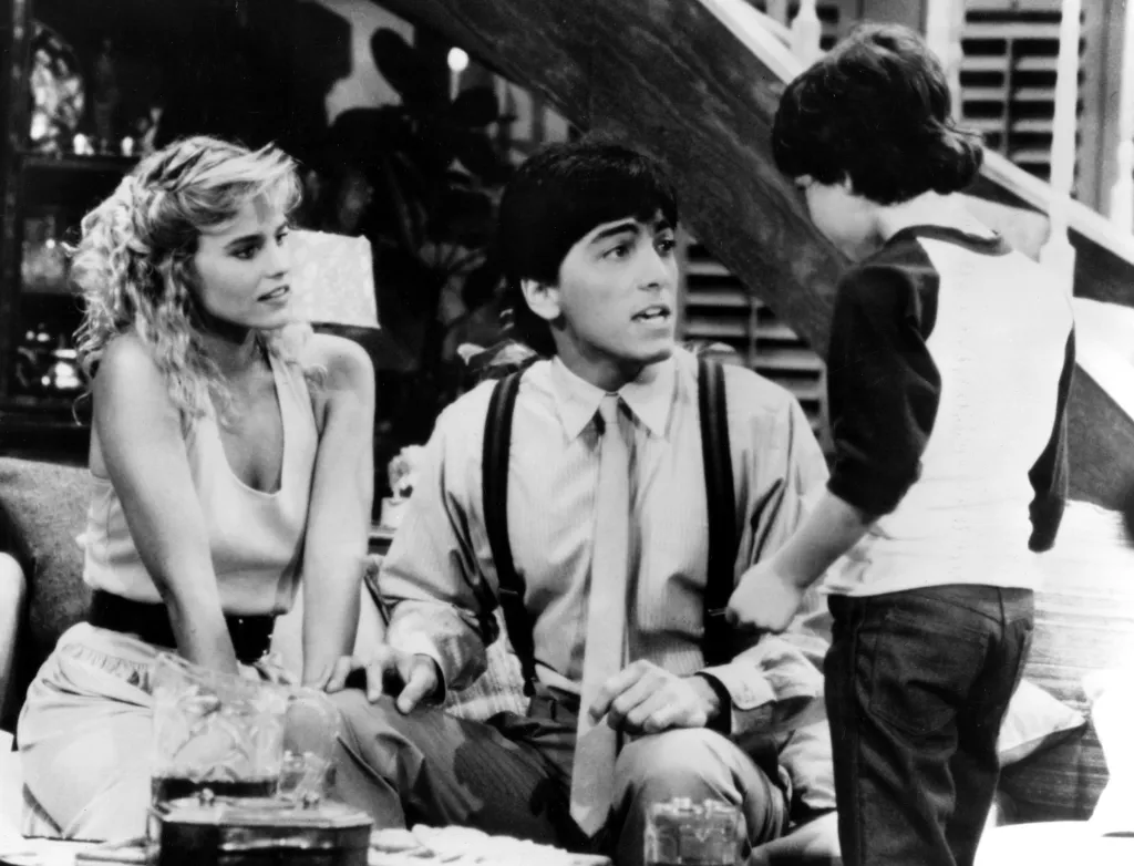 Jennifer Runyon, Scott Baio, and Michael Pearlman sitting on a couch.