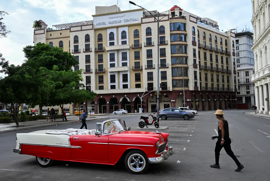 TOPSHOT - A classic American car is seen parked near the Iberostar Parque Central hotel in Havana on March 12, 2026. (Photo by YAMIL LAGE / AFP via Getty Images)