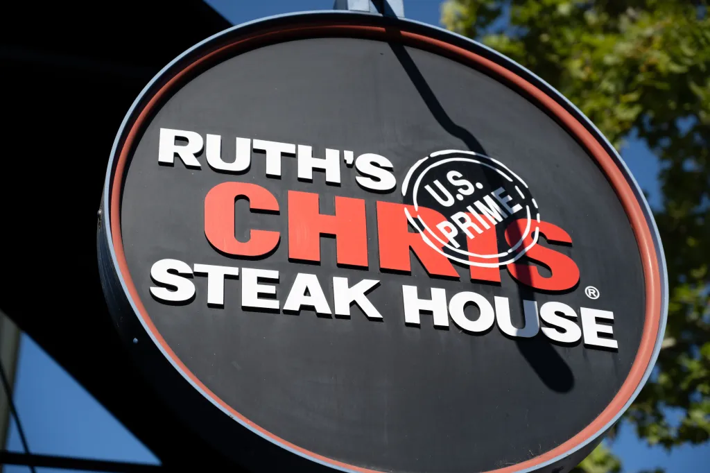 The Ruth's Chris Steak House sign on the facade of the restaurant.