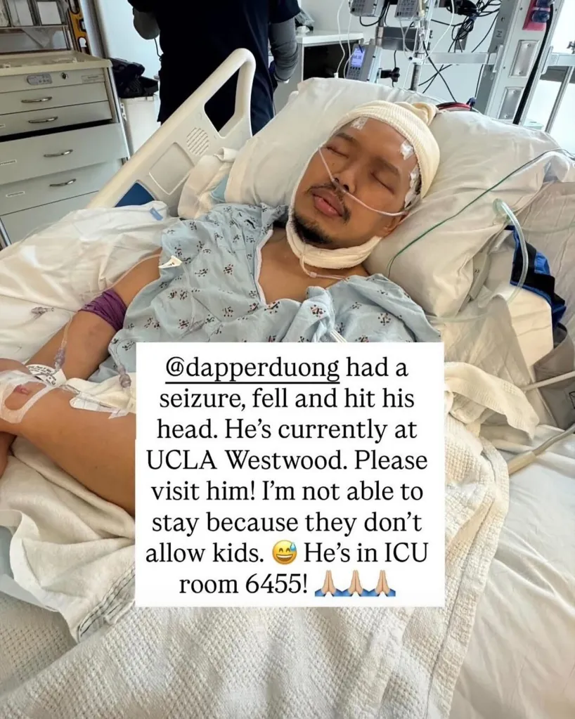 Comedian Alex Duong in a hospital bed with an IV drip and a nasal cannula, with an overlay asking for visitors.