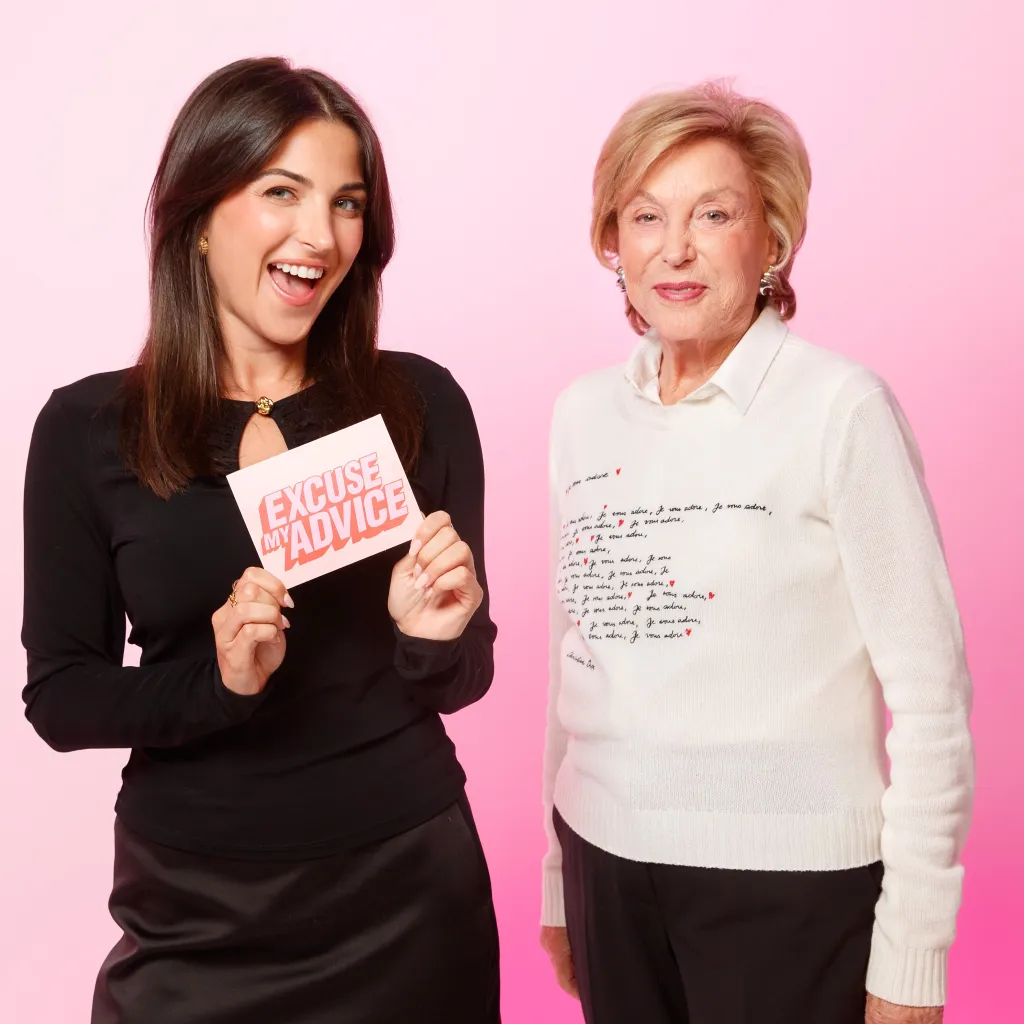 Kim Murstein holding a card that says 