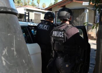 Put handcuffs on gangsters, not police