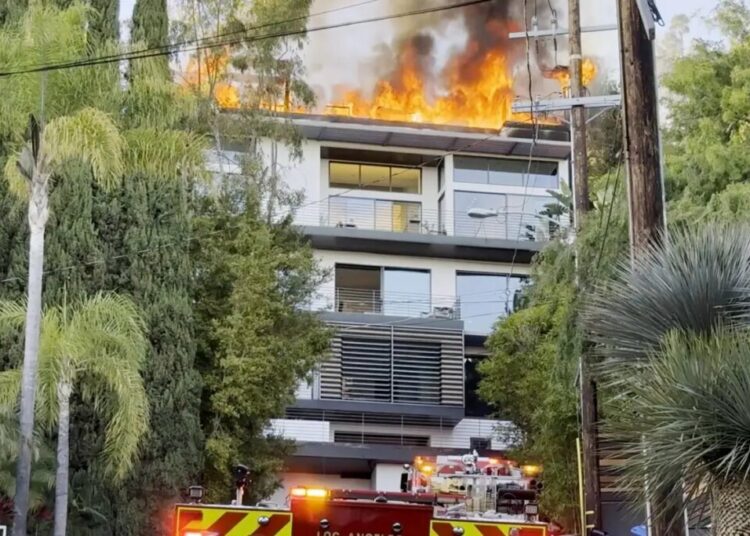 Inferno erupts at Hollywood Hills mansion as flames rip through roof