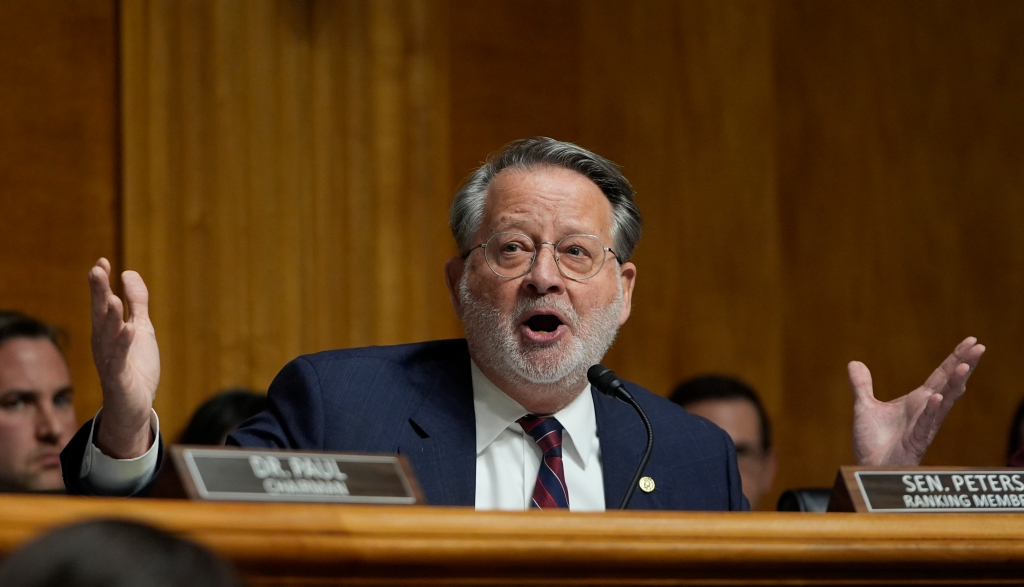 Senator Gary Peters speaking at a confirmation hearing.