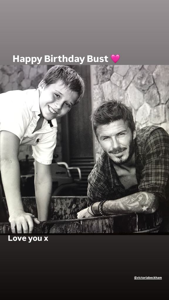 David Beckham and his son Brooklyn smiling for a photo.