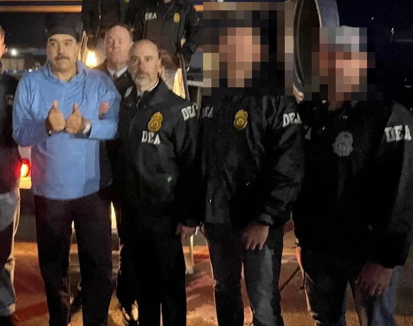 Venezuela's captured President Nicolas Maduro poses next to DEA administrator Terry Cole in Newburgh.