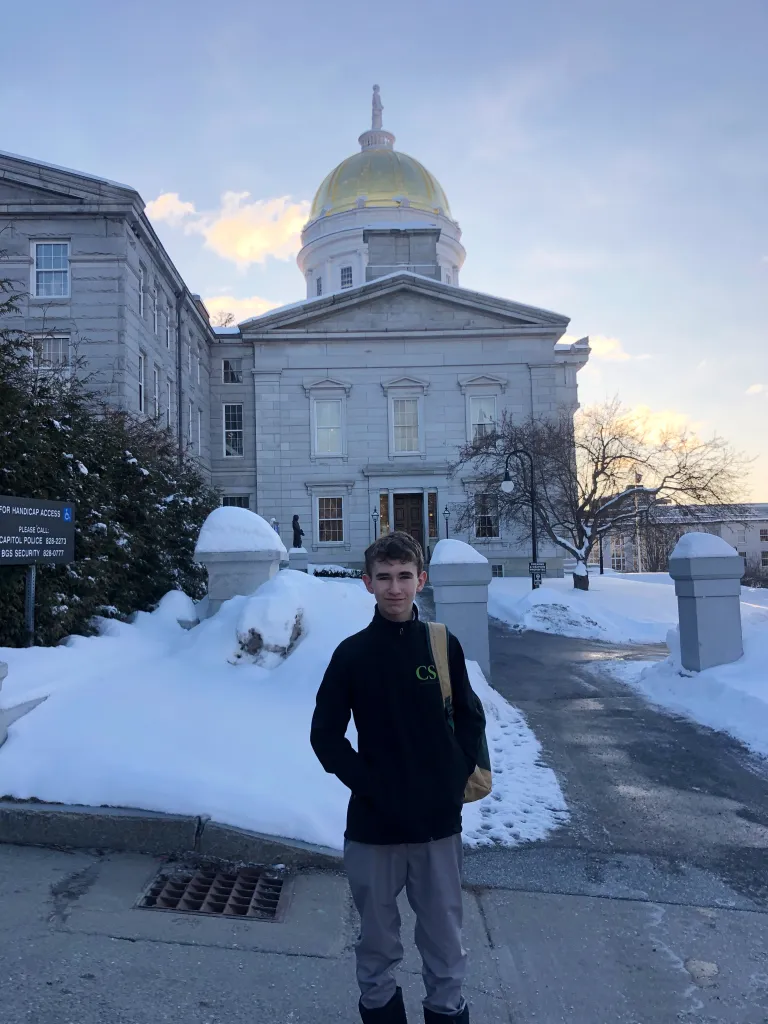 Dean Roystands stands outside the Vermont State House.